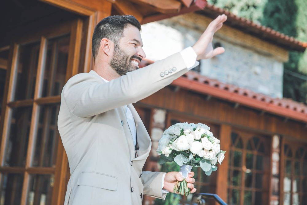 nk 21 groom bouquet smiling